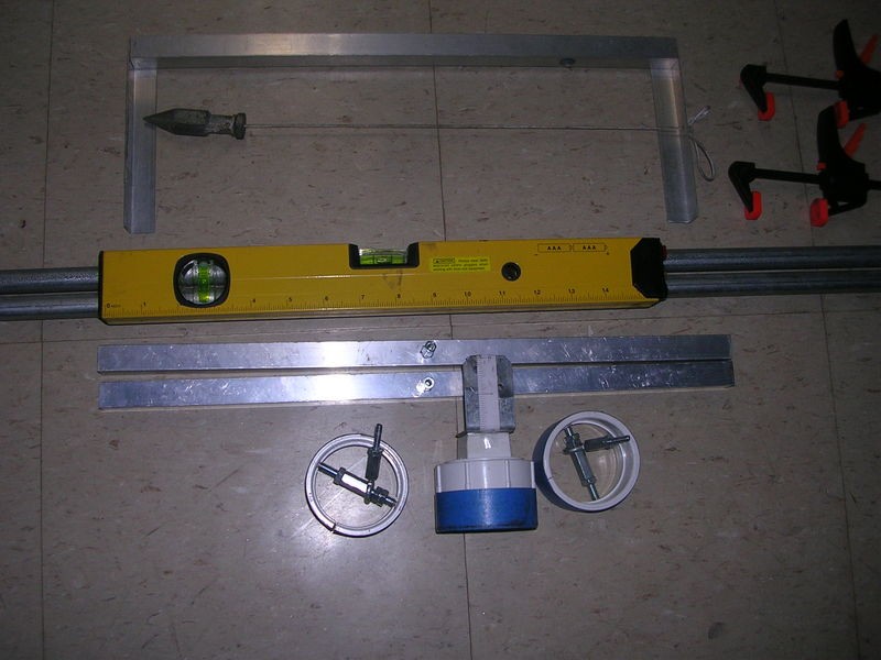 Aluminum bar mounted on a car wheel for toe measurement