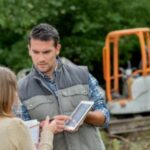 Arborist in the field tracking work