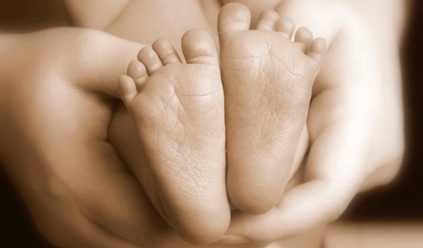 Close up of the soles of a baby